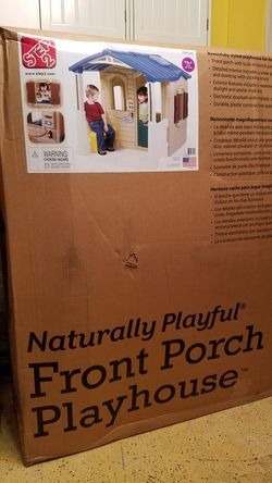 Step2 naturally playful store front porch playhouse