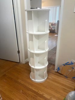 Rotating white bookshelf