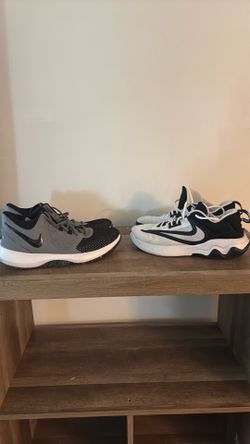 Two pairs of Nike shoe