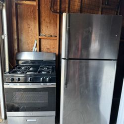 Stainless Steel Refrigerator And Stove Range 