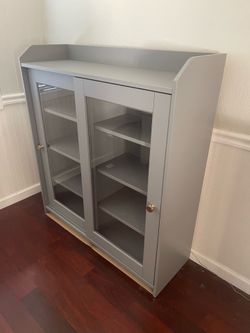 Ikea Grey Cabinet w/sliding glass doors