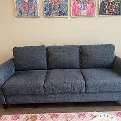 Moving Marcel three month old sofa, navy