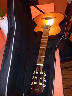 Oscar Schmidt guitar electric- acustic and amp plus the case.