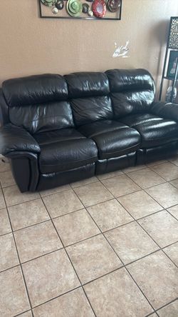 Three-seater motion reclining sofa