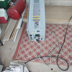 Used  Rheem Tankless Water Heater