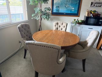 Solid Oak Dining table with 4 upholstered chairs