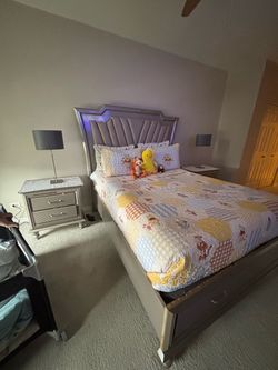 Brown and silver bedroom set