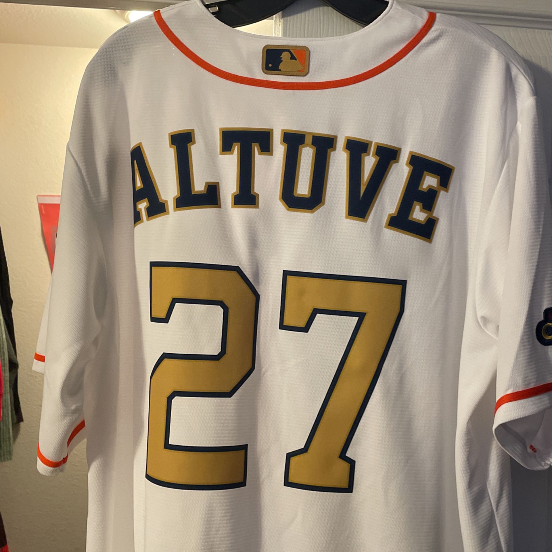 white and gold astros jersey