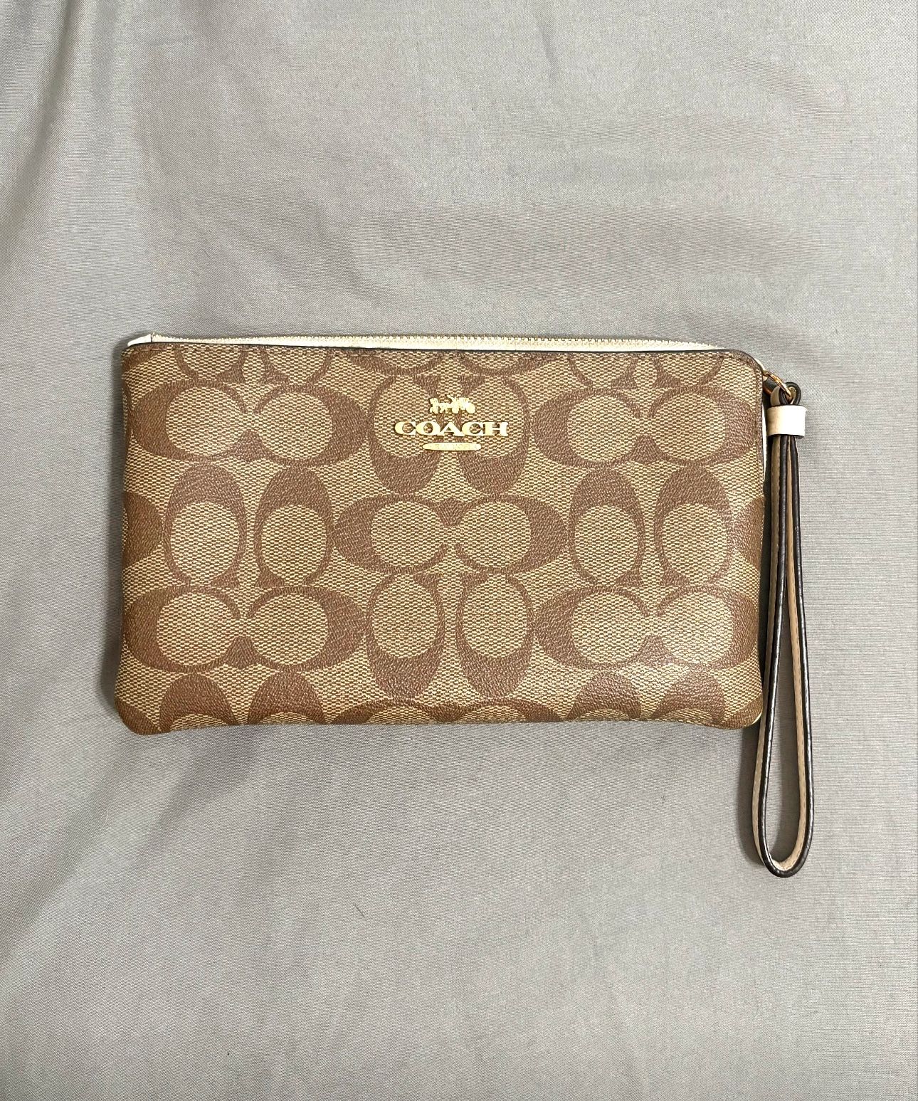 Brand new Coach wristlet