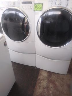 Kenmore front load washer and dryer set with pedestals in excellent conditions