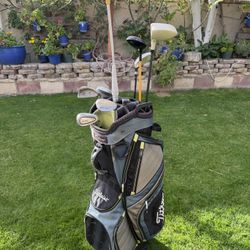 Titleist Golf Bag & Assorted Golf Clubs & Retriever