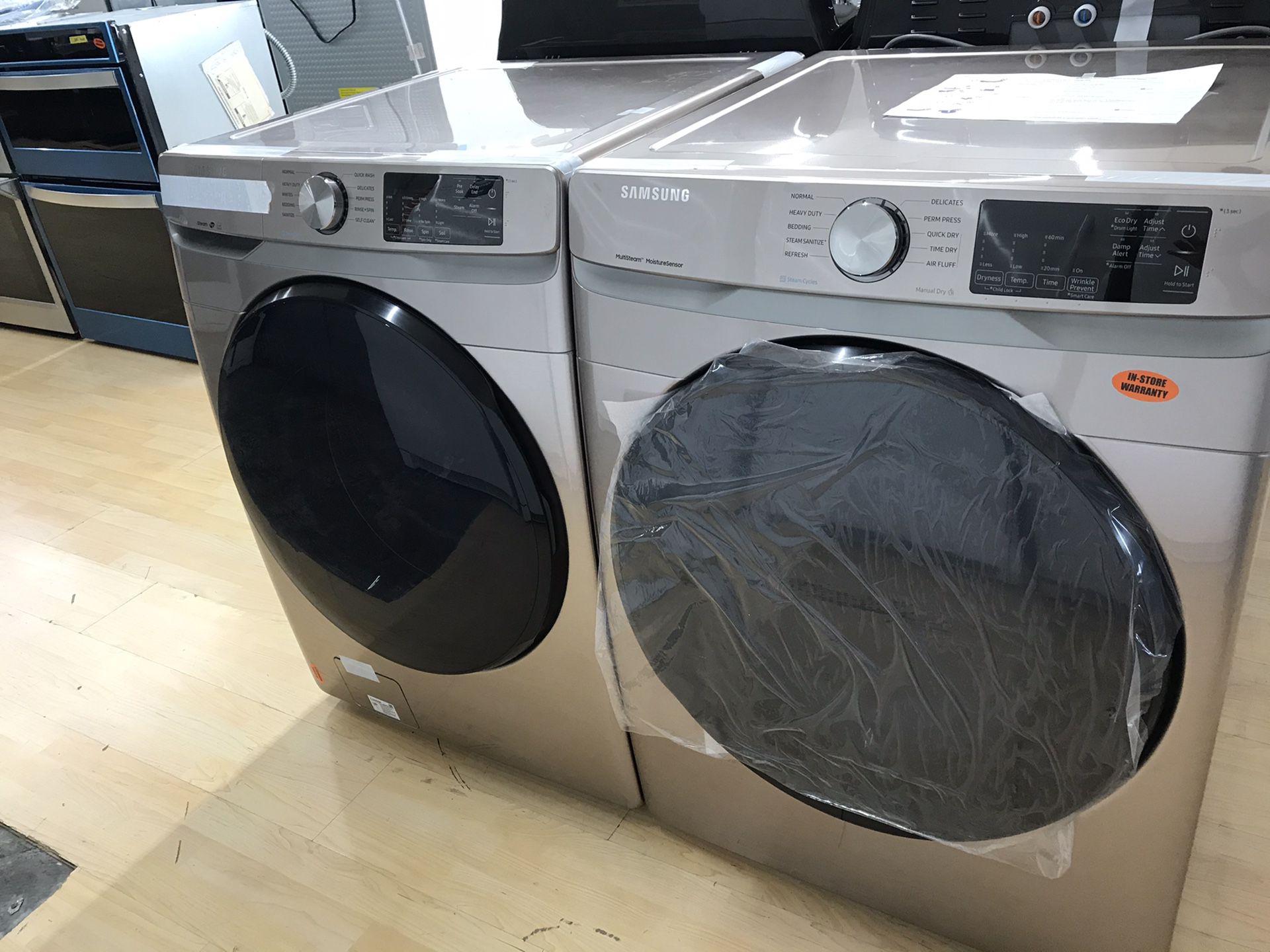Brand new front load washer and dryer set