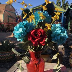 Red Vase With Faux Flowers 