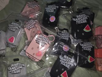 Hand sanitizer case with charms and sanitizer