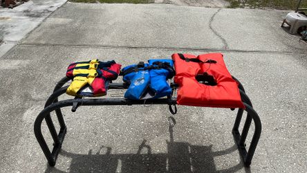 Two children’s life vest and one adult five dollars apiece