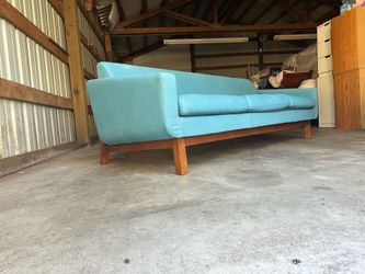 Teal mid century style couch