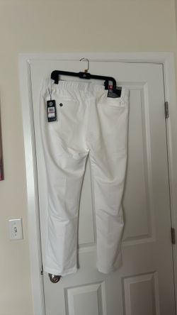 New golf men golf pants Under Armor , size 38/30, with tags
