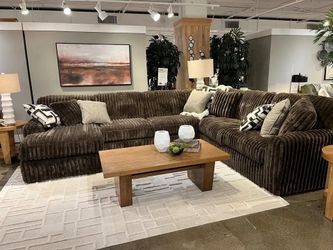 Large 3 piece Sectional features luxuriously soft jumbo corduroy fabric