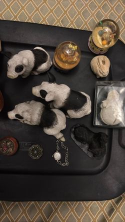 Antique bear, pig, snow, globes, and some antique medicine containers
