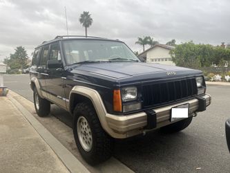1993 Jeep Cherokee XJ Country 4x4 – 4.0L / AX-15 5-Speed – Factory Upcountry & External Tire Carrier