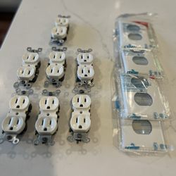 White Electrical Outlets And Wall Plates.   