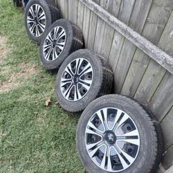 Like New (slightly Used) (4) Goodyear Tires And Rims W/ Hubcaps