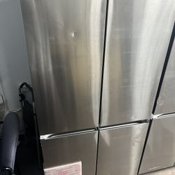 Samsung stainless steel French door fridge with ice/water maker on inside 