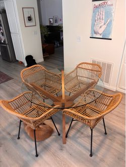 Dining table and chairs with cushions