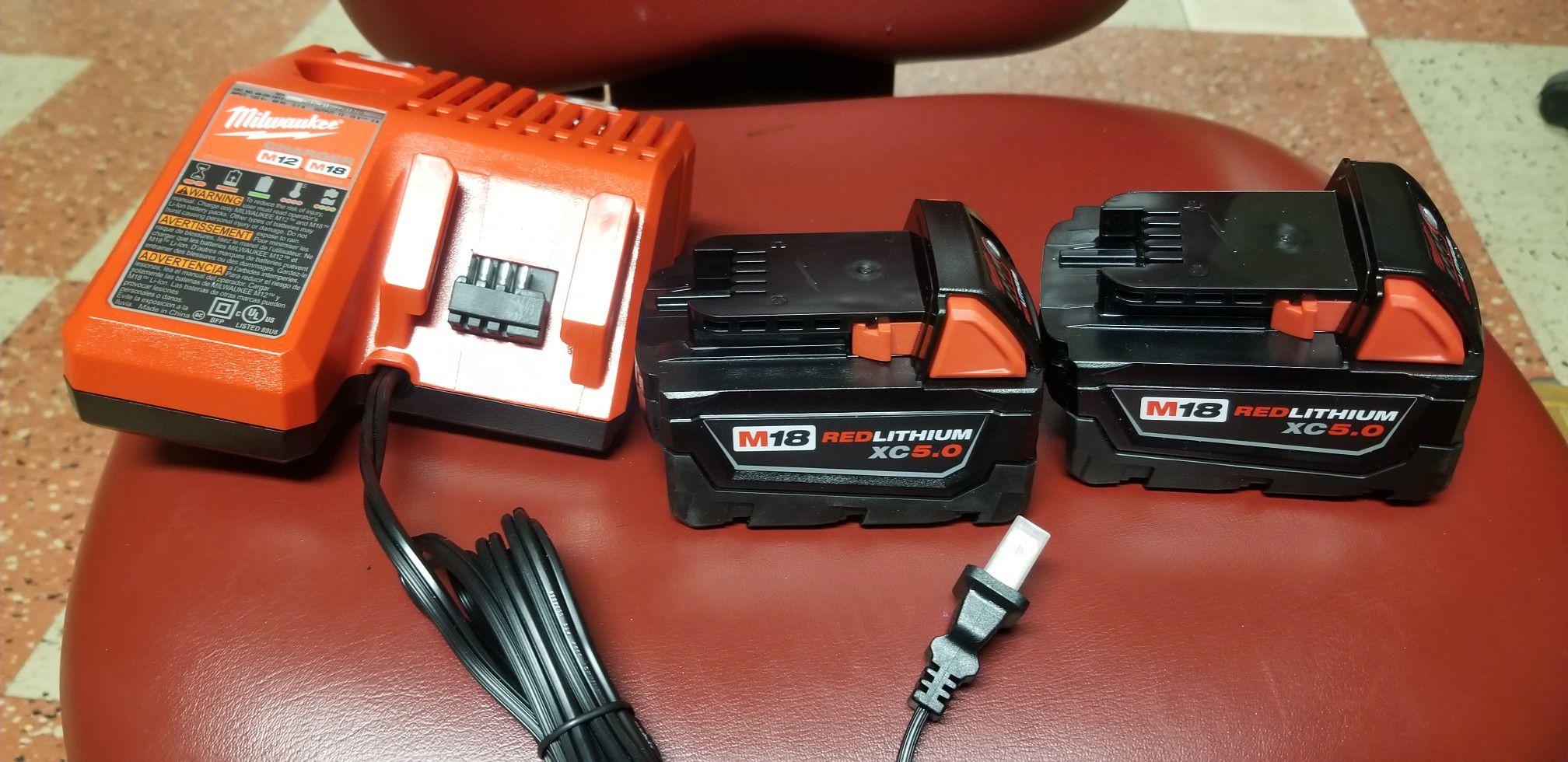 Milwaukee battery and charger brand new