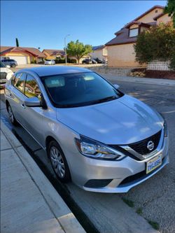 Nissan Sentra Silver 4-Door Sedan
