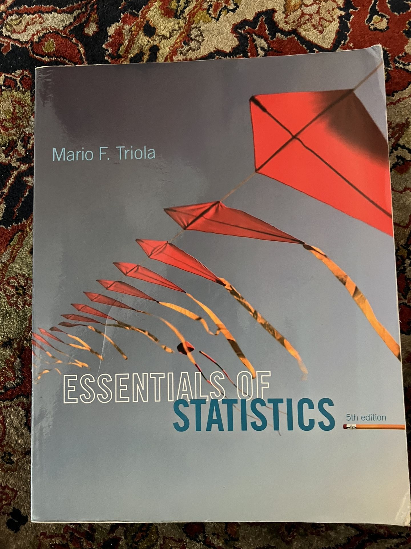 Essentials of Statistics Textbook