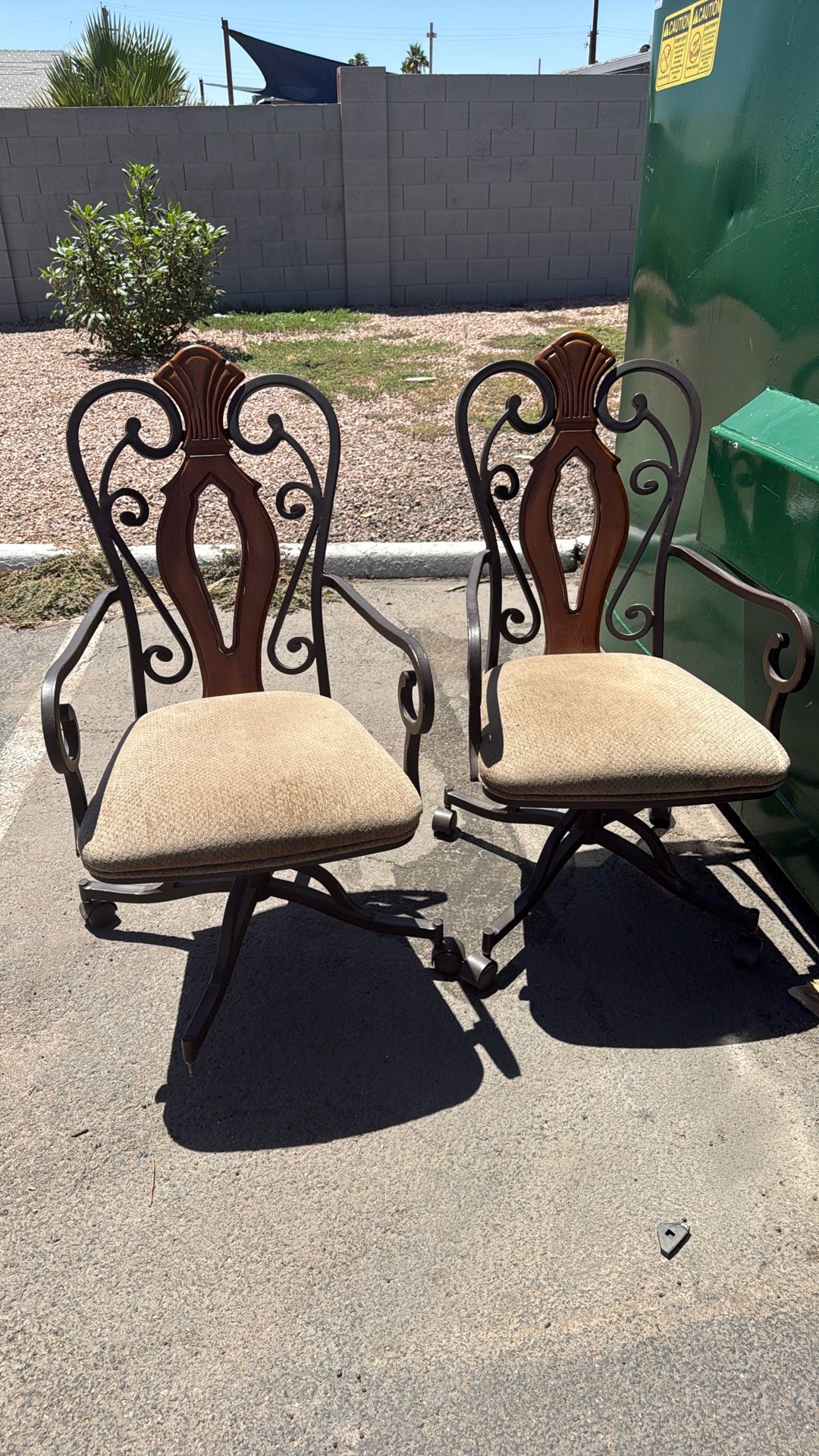 2 Swivel Rolling Brown Dinning Room Chairs