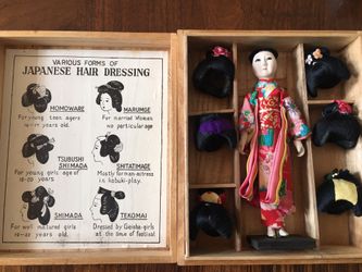 Antique Japanese doll with multiple wigs