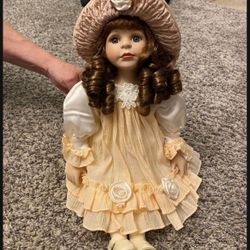 Porcelain Doll in Peach Colored Outfit from Switzerland
