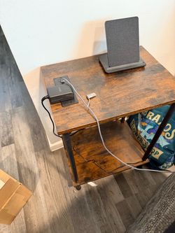 Side table with outlet to charge