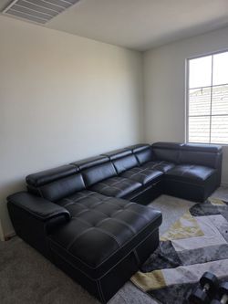 Black leather - Dante 4 pc sectional with pull out bed sofa