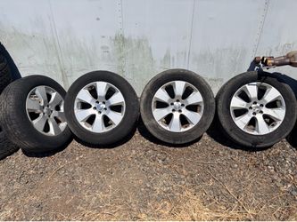 4 Subaru tires and rims (Used)