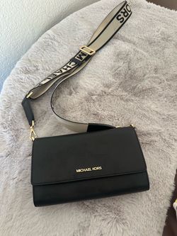 Mk cross body purse.