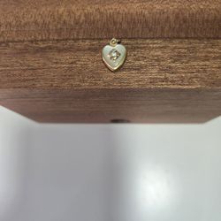 14kt Baby Locket With Mother Of Pearl And Diamond 