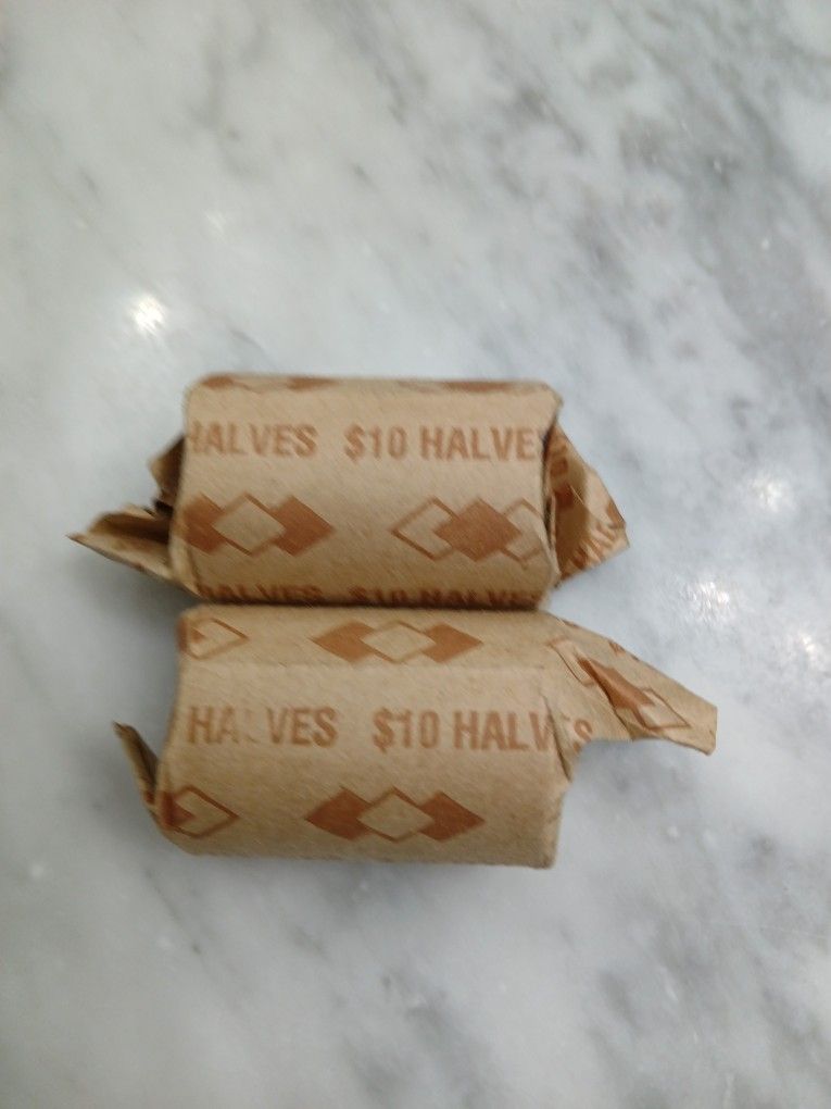 Two Rolls Of Half Dollars Never Opened