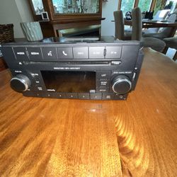 Chrysler stock radio part # P0(contact info removed)AC fits Chrysler Dodge & Jeep models CD disc MP3  anti theft SiriusXM 