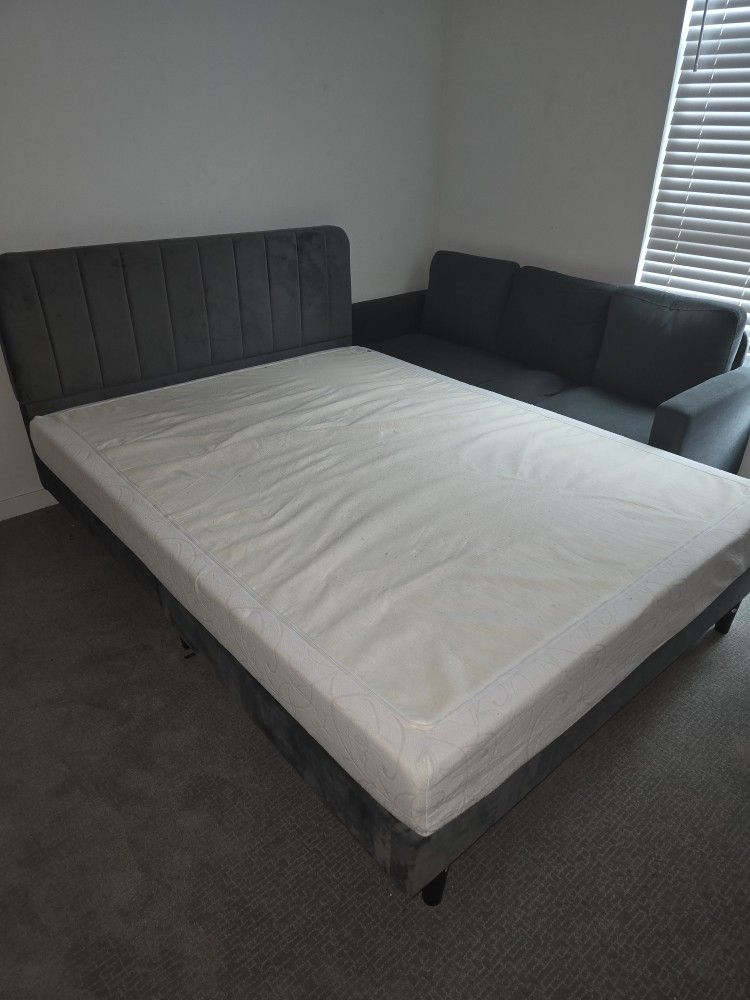 Queen Bed Frame and Grey Couch.