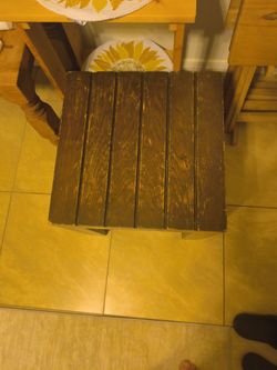 Dark brown wooden end table