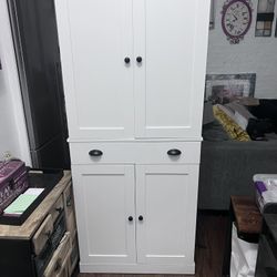 White Kitchen Pantry With Sliding Storage Racks and Shelves