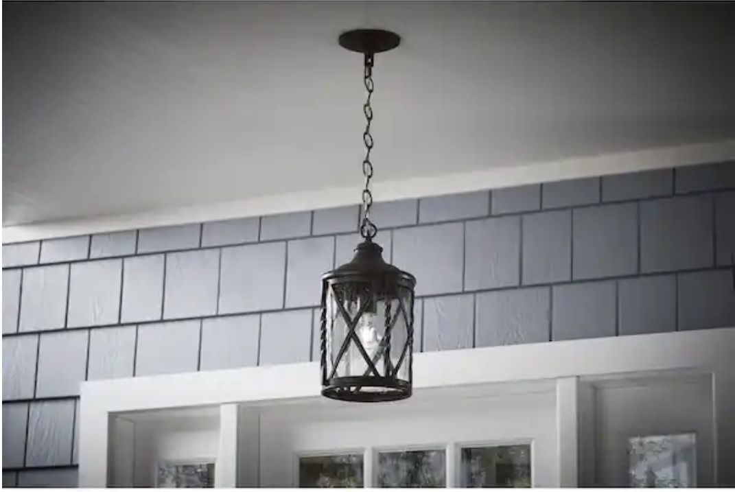 BRAND NEW HOME DECORATORS COLLECTION OUTDOOR HANGING LANTERN . ANTIQUE PEWTER FINISH. VERY SHARP!