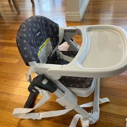 Kids booster seat with food tray