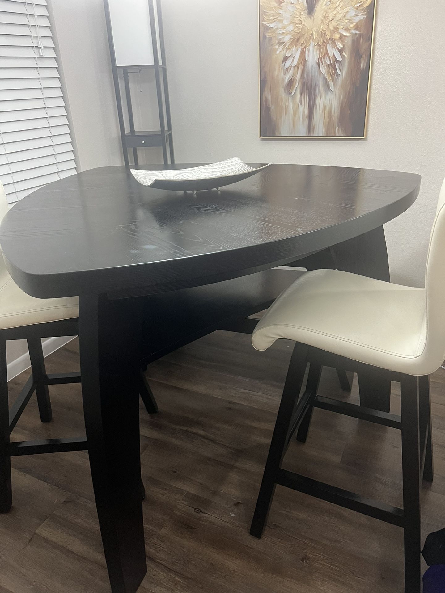 High Dining room table and two chairs and sofa sitting for table