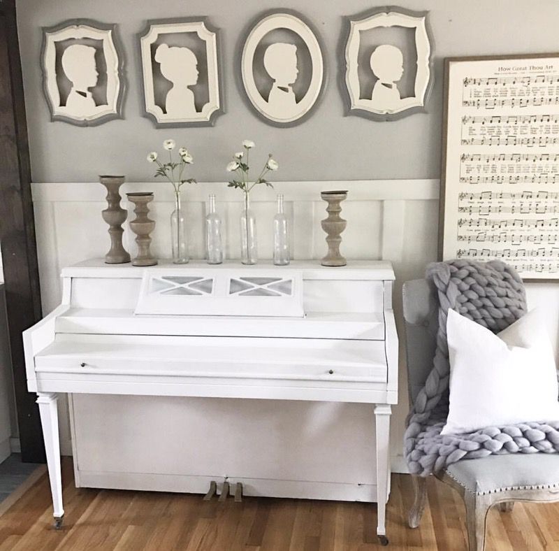 White piano and bench