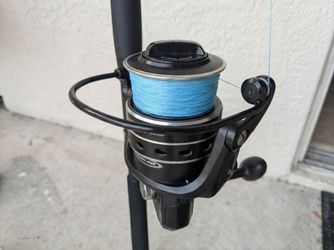 Penn III pursuit 6000 with 7ft med heavy rod