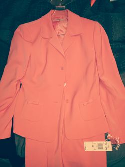 Pink female dress jacket and skirt